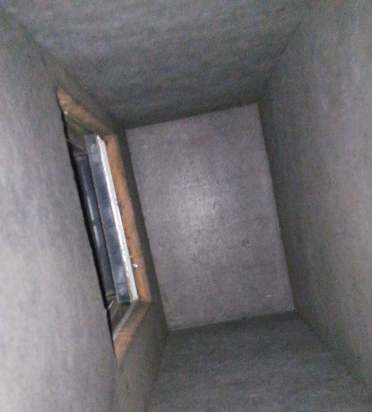 Inside an attic access opening showing gaps that need air sealing