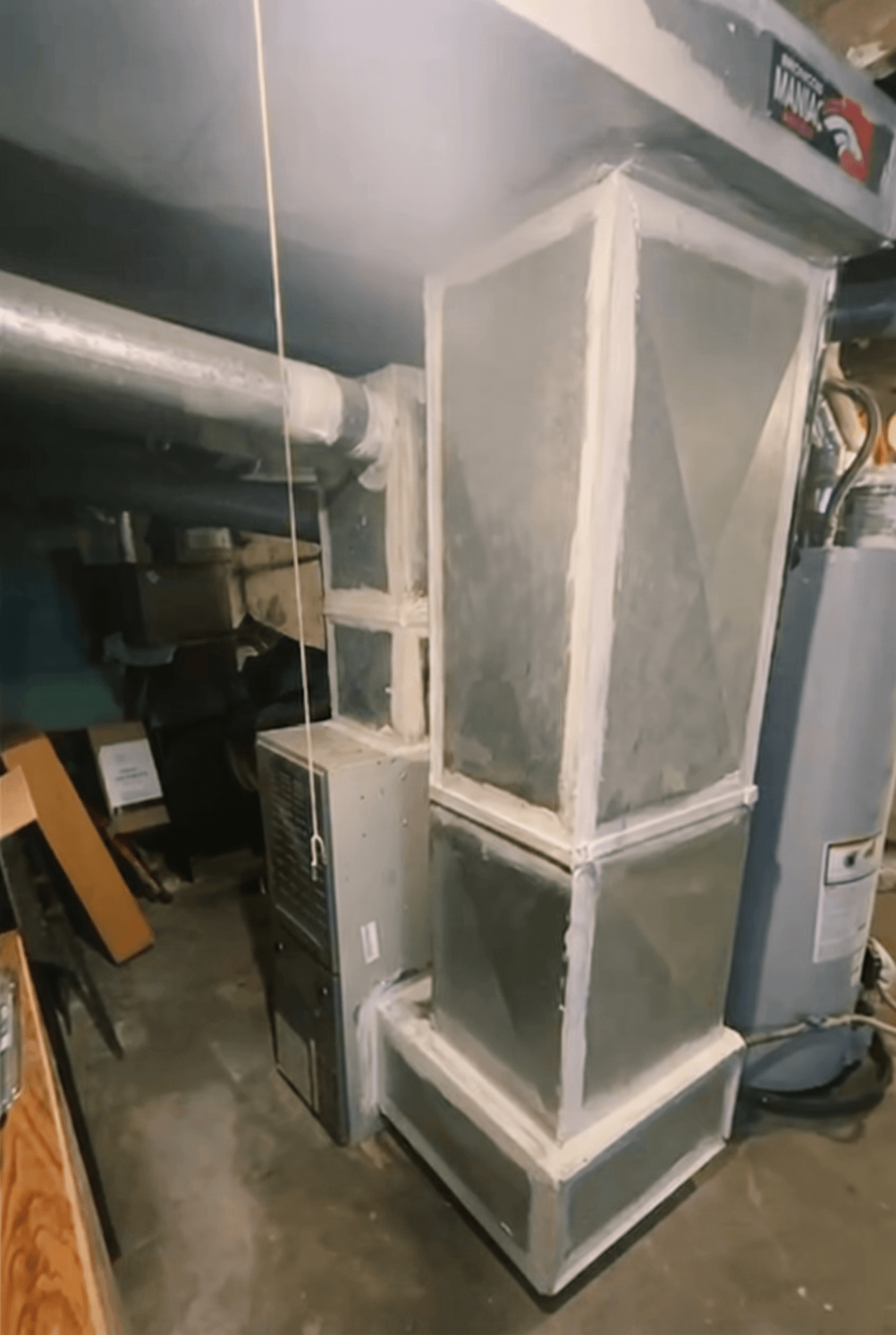 Air handler plenum in a mechanical closet with every seam fully mastic-sealed